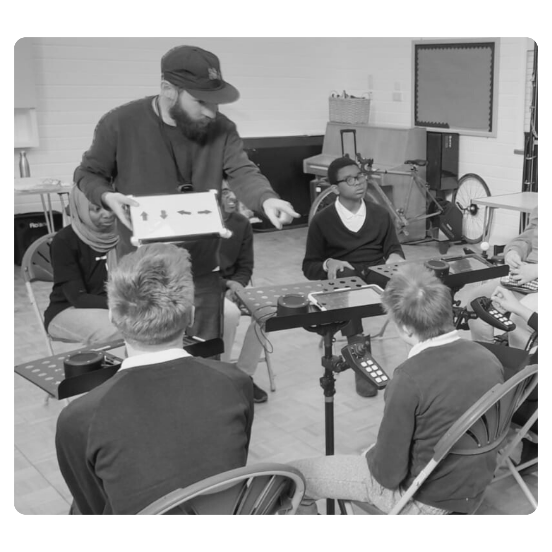 A participant making music at a Digit session.